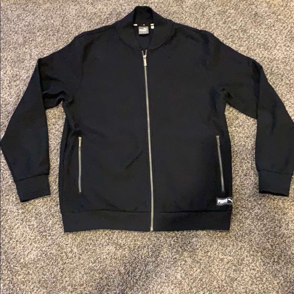 Large black men’s Puma zip-up sweater